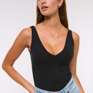 ABIBELLE BLACK BODYSUIT SIZE SMALL